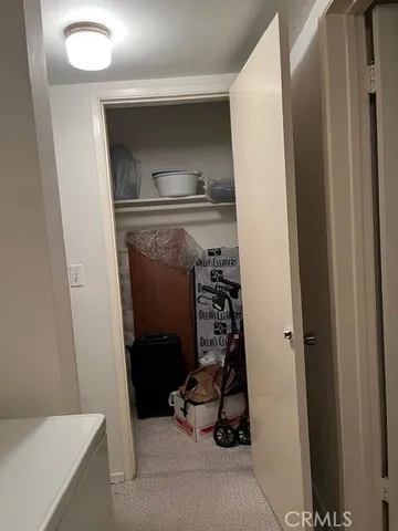 a view of a workspace with furniture