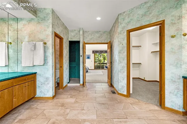 a view of a door and a window