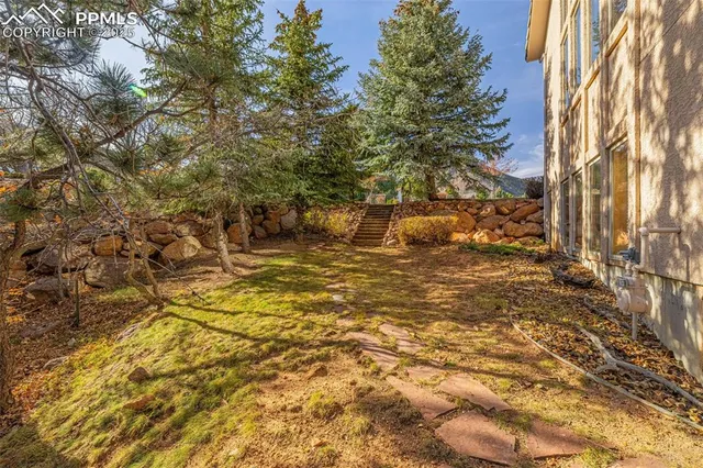 a view of a swimming pool with an outdoor space and seating area