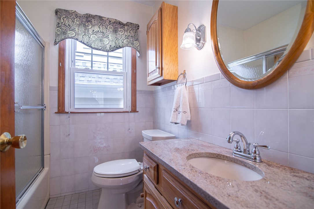 19 Lyndon Road Cranston, RI 02905 - Photo 23 of 29 First floor bath. Updated w/ new tub insert.