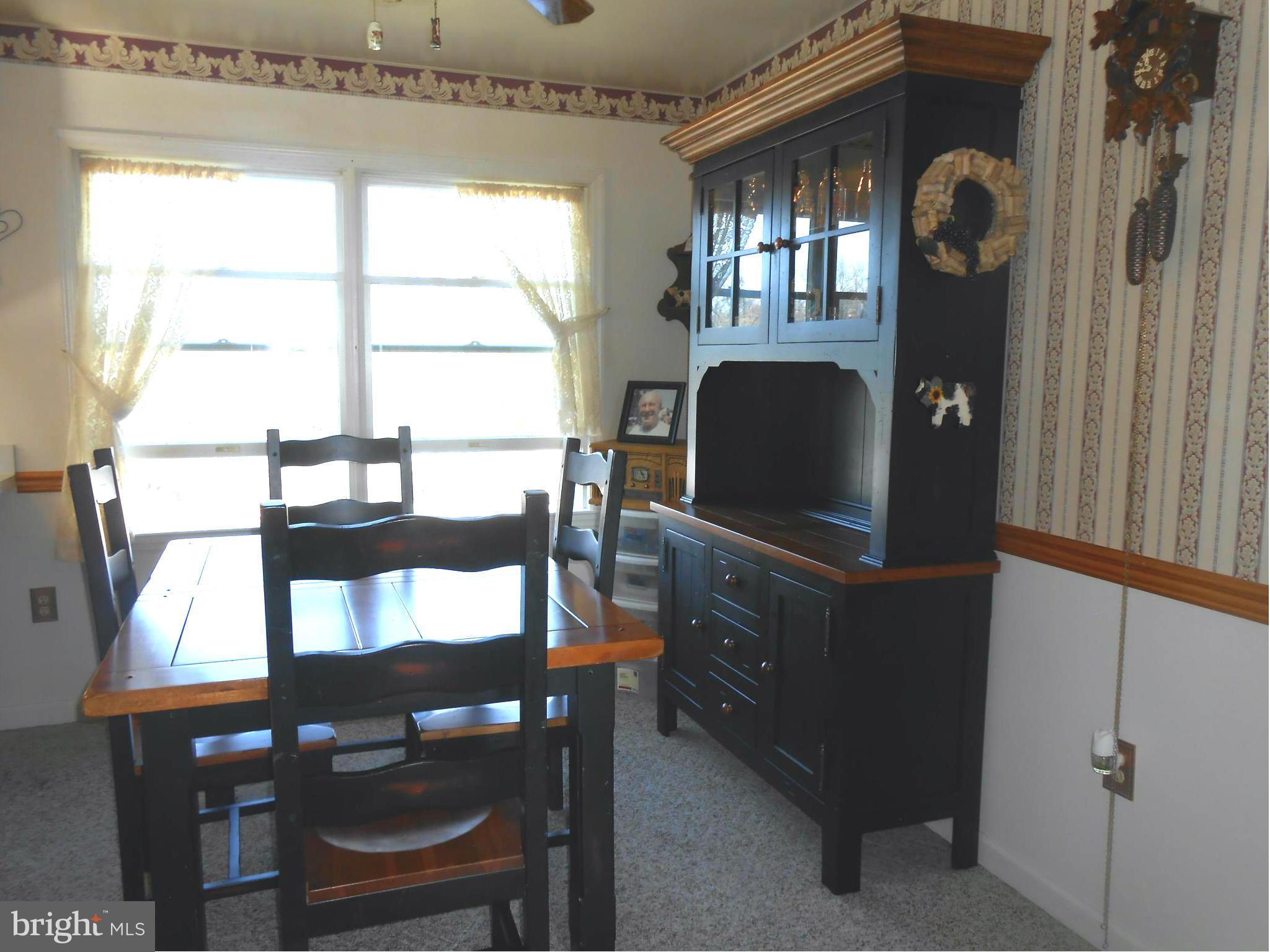 14120 Fairview Road Clear Spring, MD 21722 - Photo 12 of 27 Lots of light in DRm space for buffet
