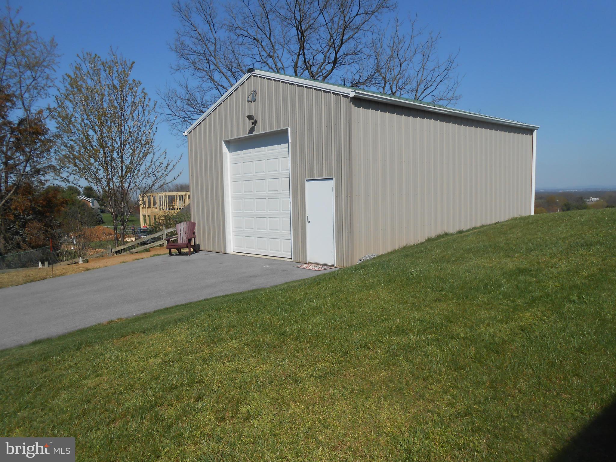 30x30, insulated pole building w/12 ft. door