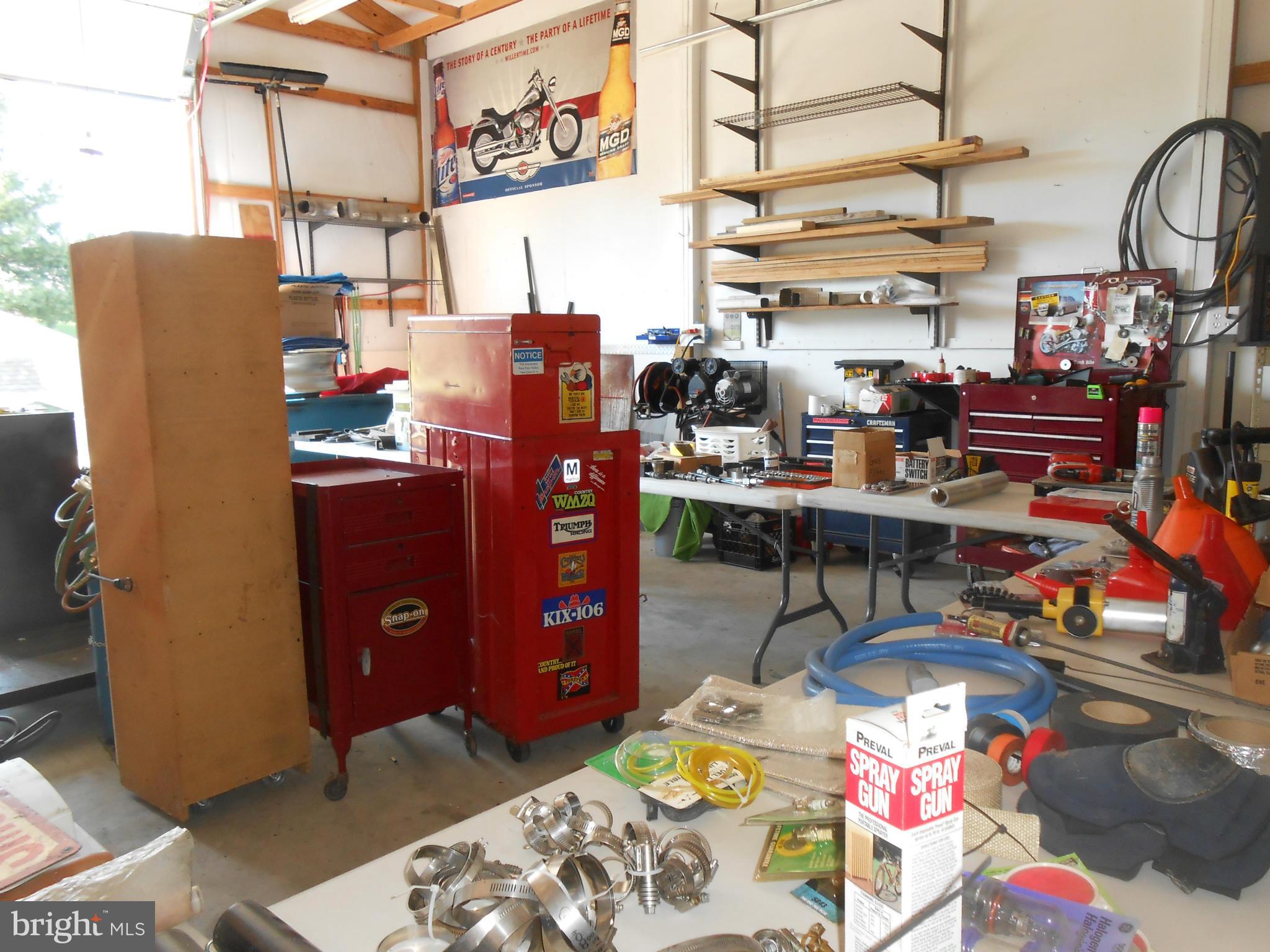 Inside of 30x30 pole building- parking for 4  cars