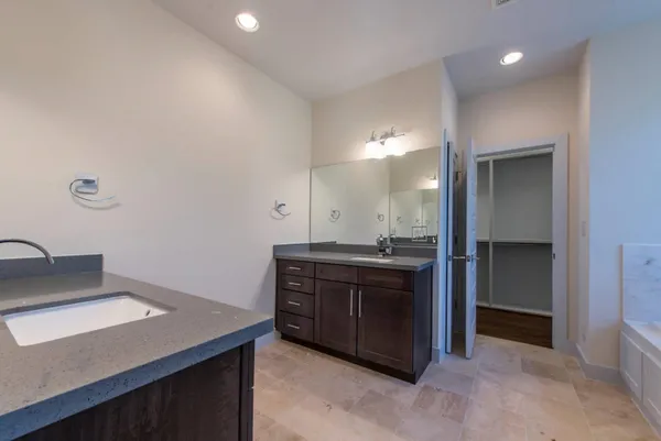 a kitchen with a stove and a sink