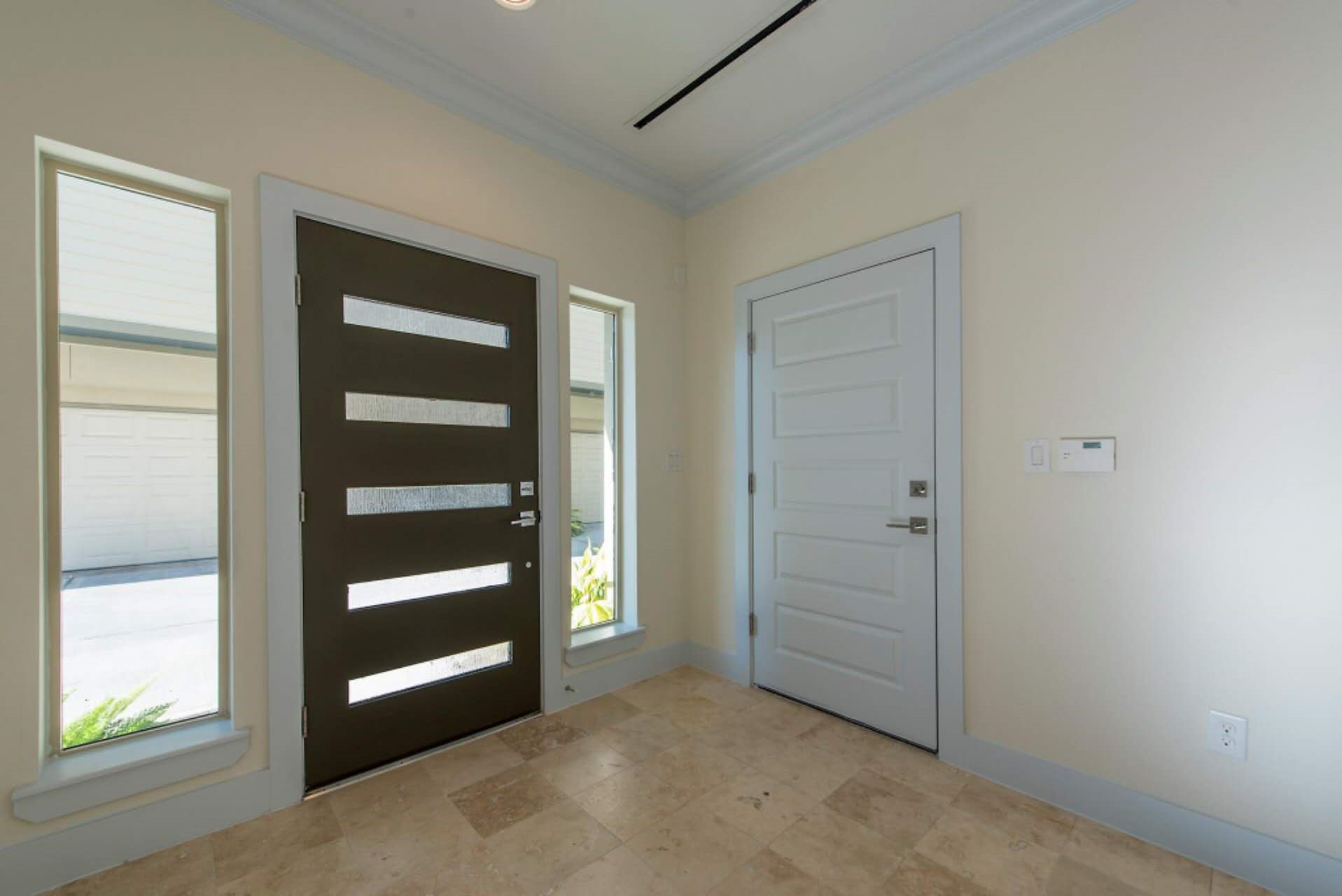 1805 Rosedale Street Houston, TX 77004 - Photo 8 of 27 a view of an empty room with a window