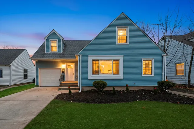 a backyard of a house with barbeque oven