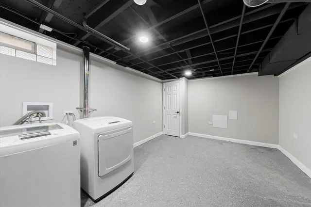 a view of a house with a big yard and sitting area