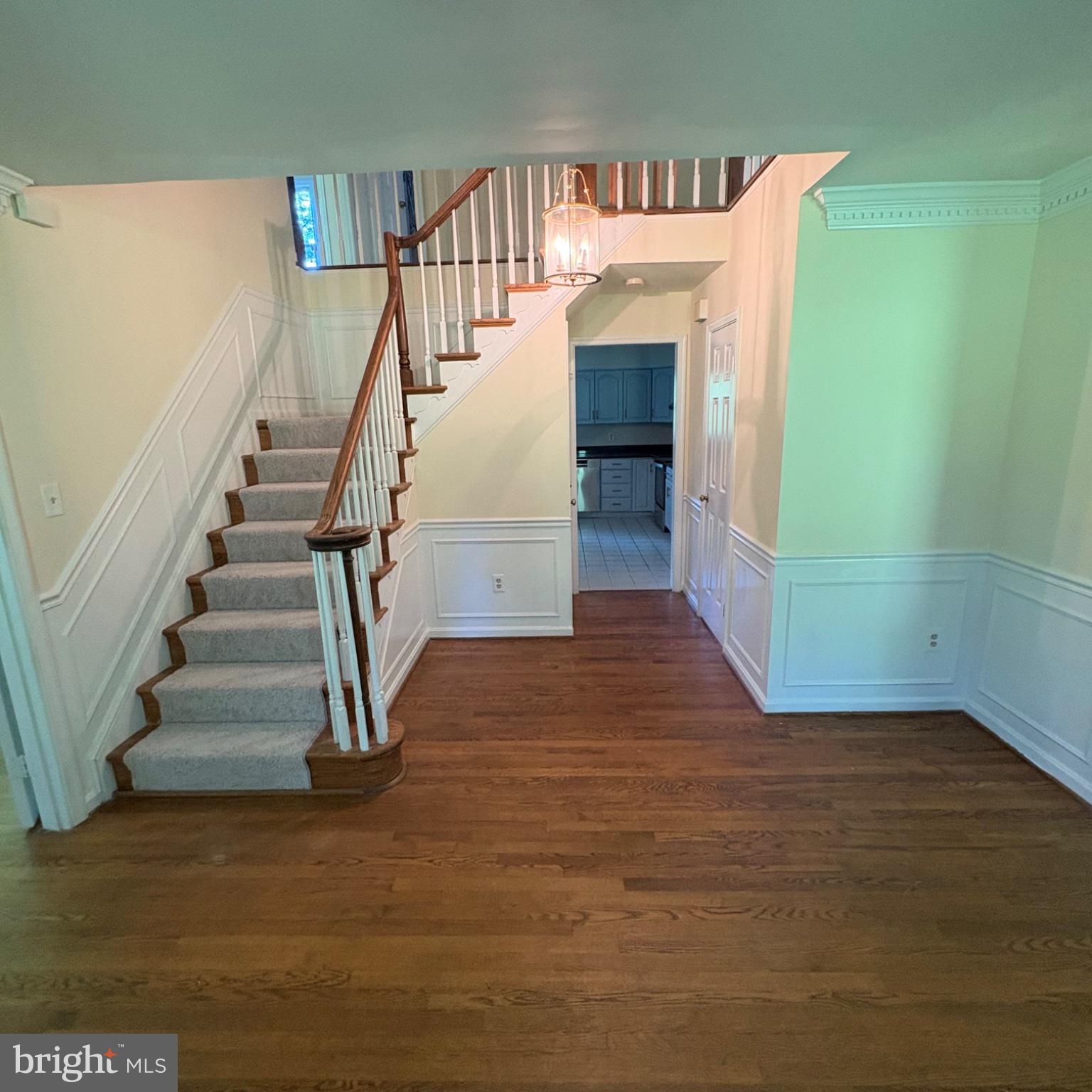 3502 Holly Road Annandale, VA 22003 - Photo 51 of 57 a view of entryway and hall with wooden floor