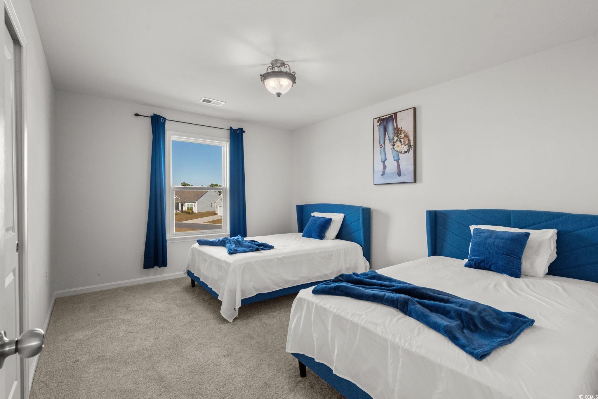 1663 Villena Drive Myrtle Beach, SC 29579 - Photo 25 of 40 Carpeted bedroom with baseboards