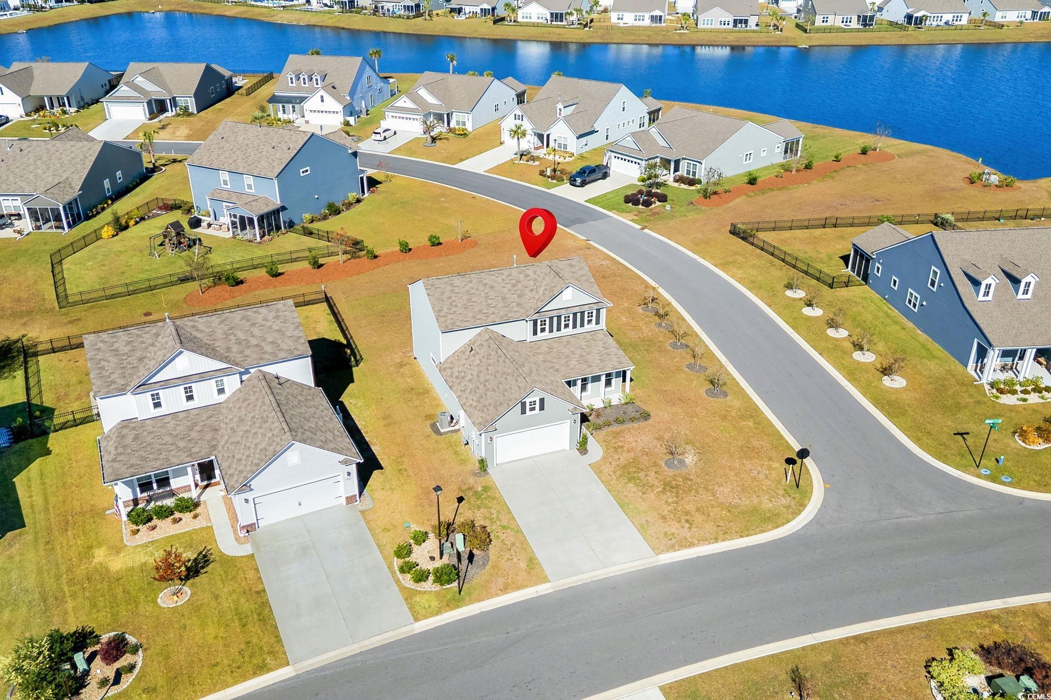 1663 Villena Drive Myrtle Beach, SC 29579 - Photo 28 of 40 Aerial view of residential area featuring a nearby body of water