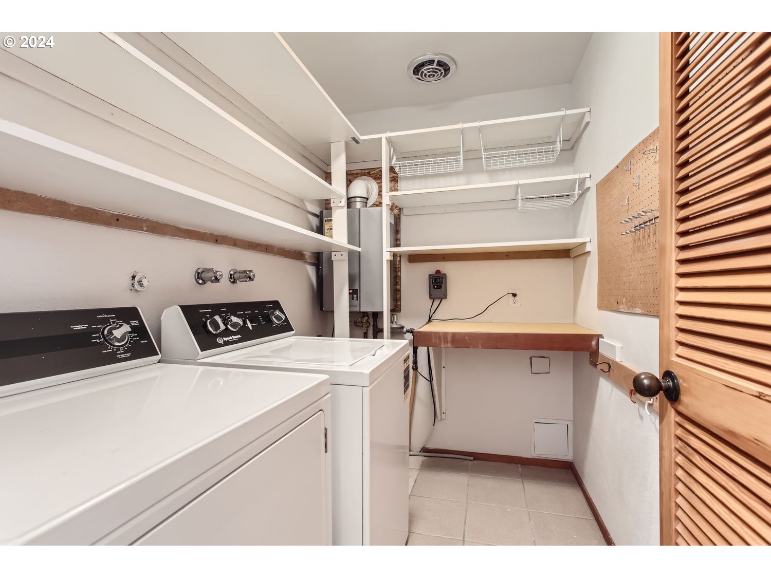3831 Southwest Dosch Road Portland, OR 97239 - Photo 24 of 29 a utility room with dryer and washer