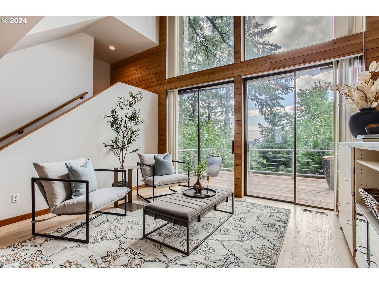 3831 Southwest Dosch Road Portland, OR 97239 - Photo 4 of 29 a living room with furniture and a large window