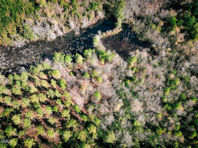 a view of a wooden fence