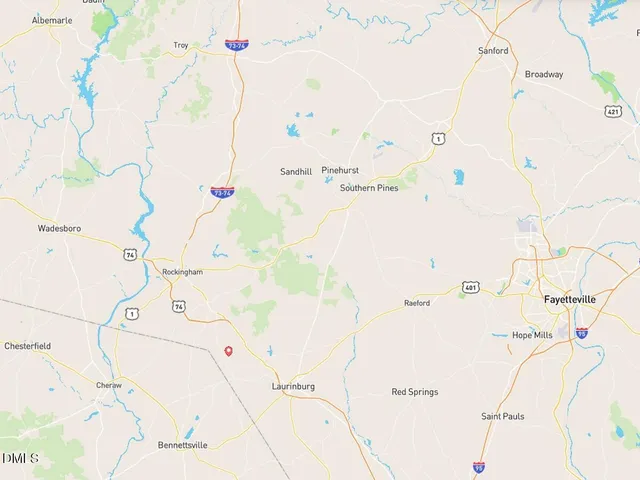 a view of a backyard of the house