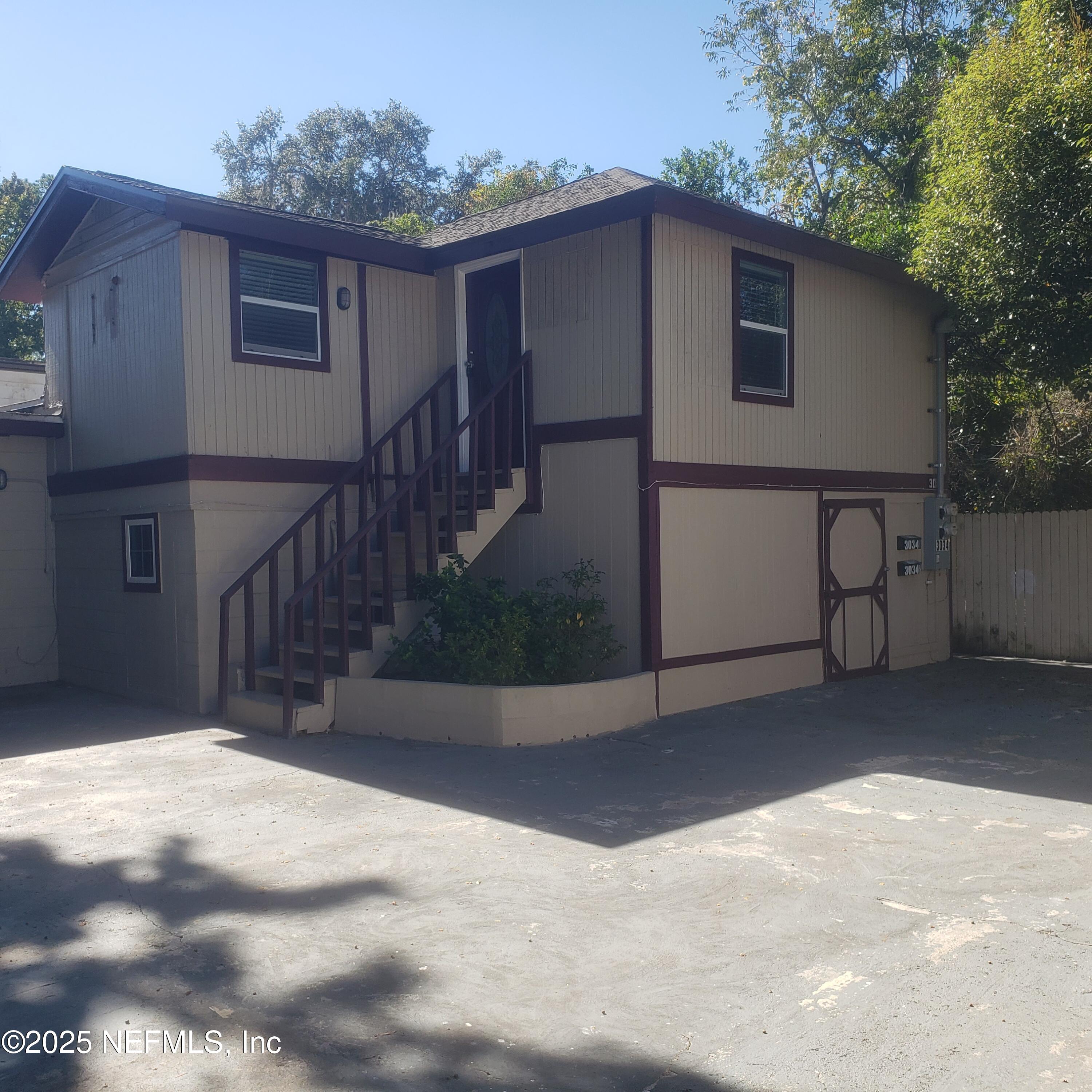 3034 Post Street Jacksonville, FL 32205 - Photo 1 of 12 a view of a house with a garage