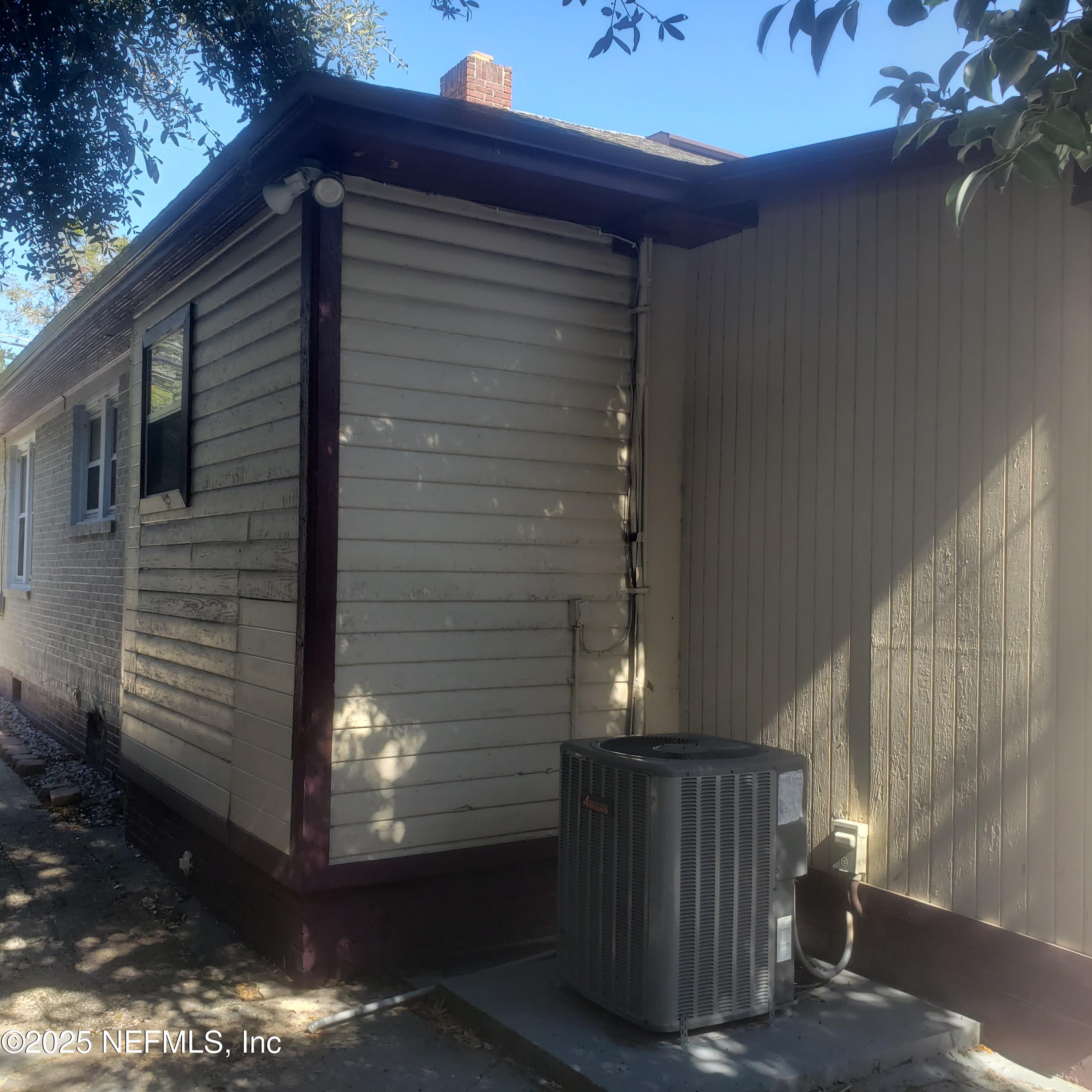 3034 Post Street Jacksonville, FL 32205 - Photo 7 of 12 a view of backyard from wooden door
