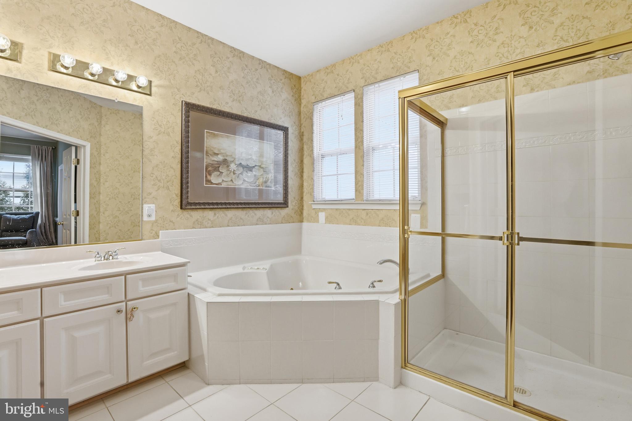 1612 Trawler Lane Annapolis, MD 21409 - Photo 15 of 48 a bathroom with a bathtub and a shower