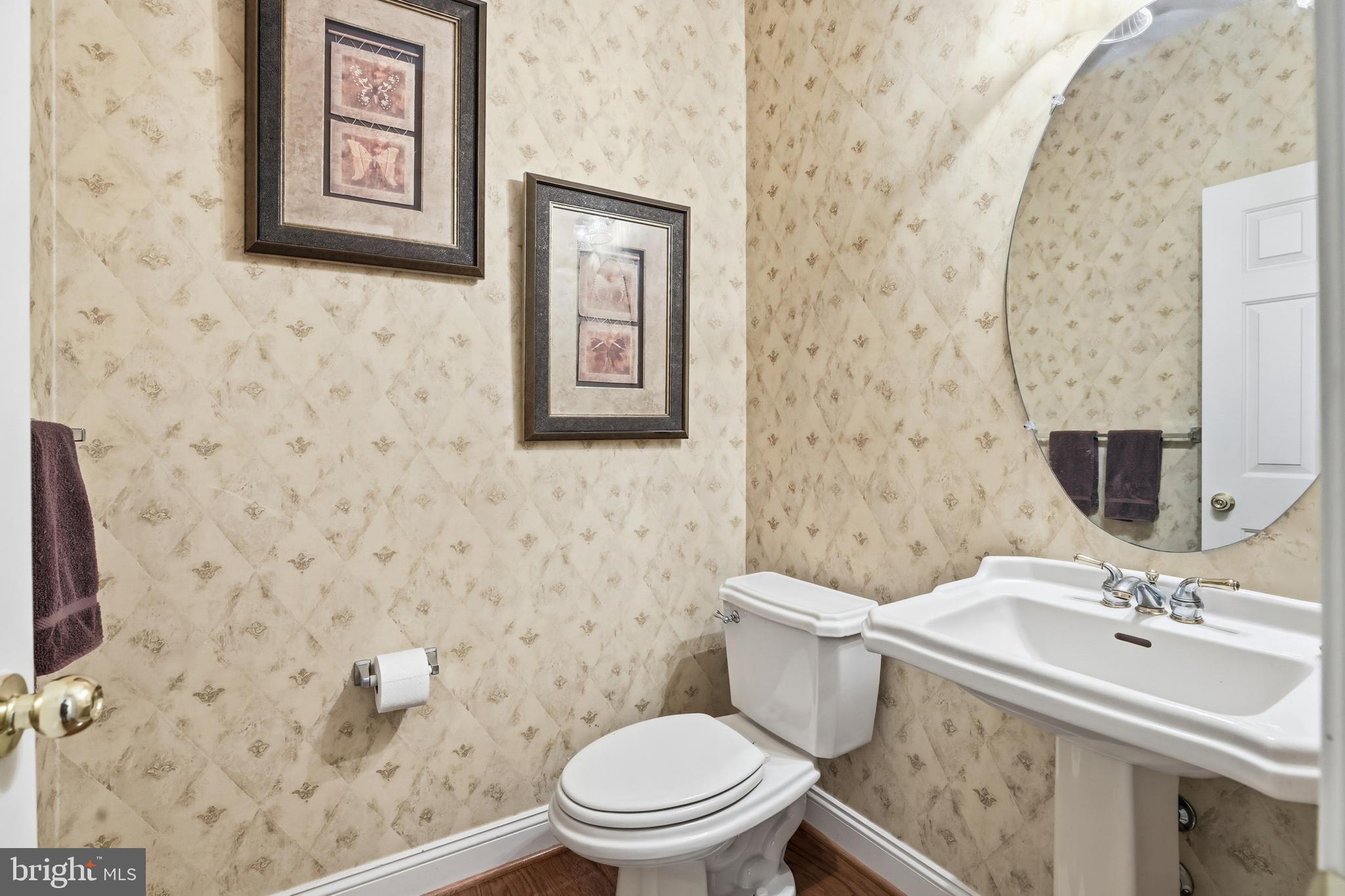 1612 Trawler Lane Annapolis, MD 21409 - Photo 19 of 48 a bathroom with a sink and a toilet