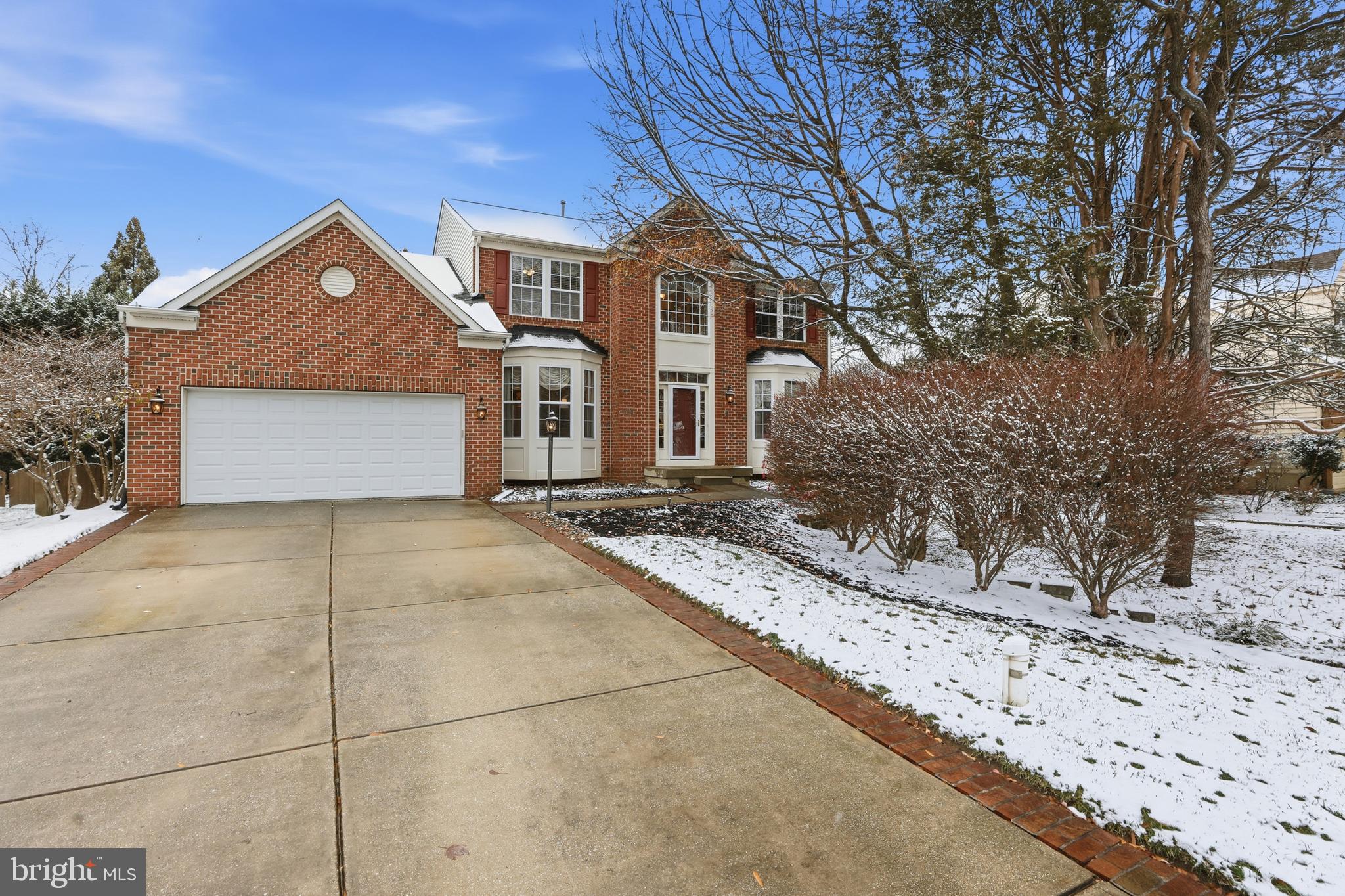 1612 Trawler Lane Annapolis, MD 21409 - Photo 2 of 48 a front view of a house with a yard and garage