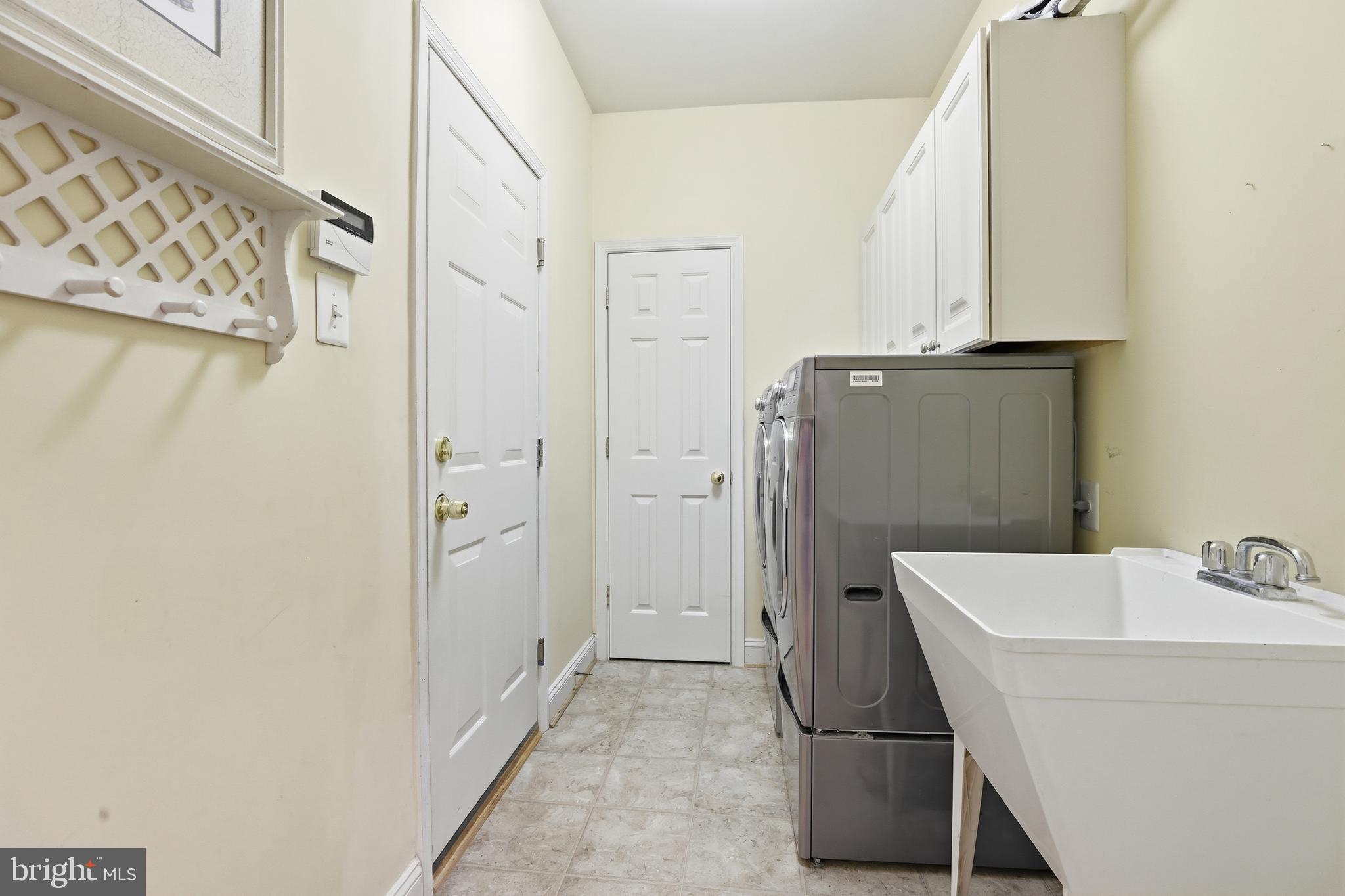 1612 Trawler Lane Annapolis, MD 21409 - Photo 20 of 48 a bathroom with a sink and a mirror