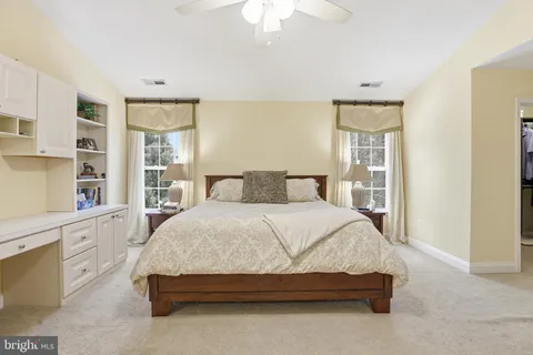 a view of a hallway with windows