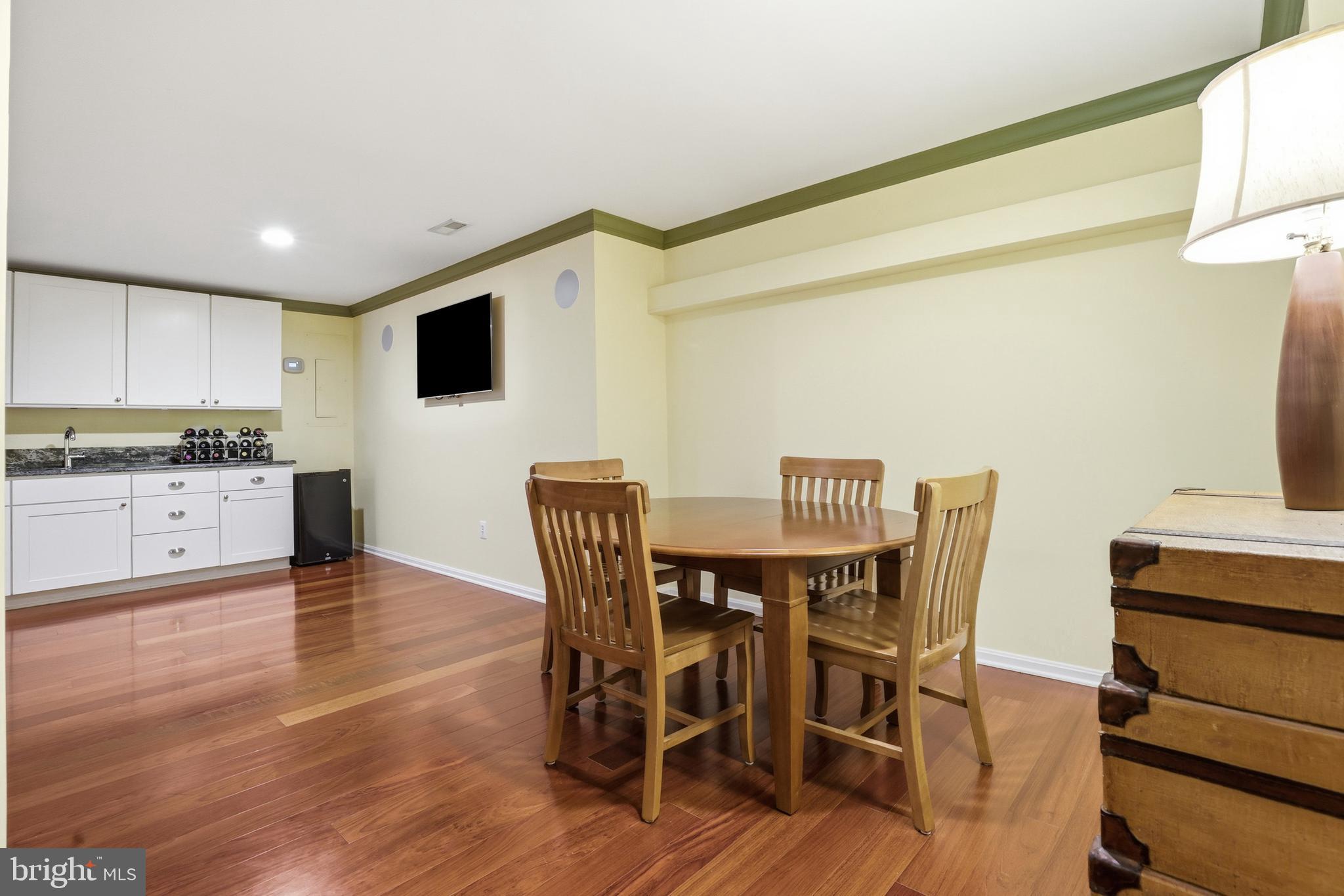 1612 Trawler Lane Annapolis, MD 21409 - Photo 33 of 48 a view of a dining room with furniture and wooden floor