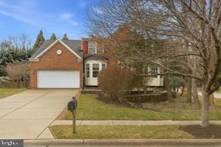 1612 Trawler Lane Annapolis, MD 21409 - Photo 40 of 48 a front view of a house with trees
