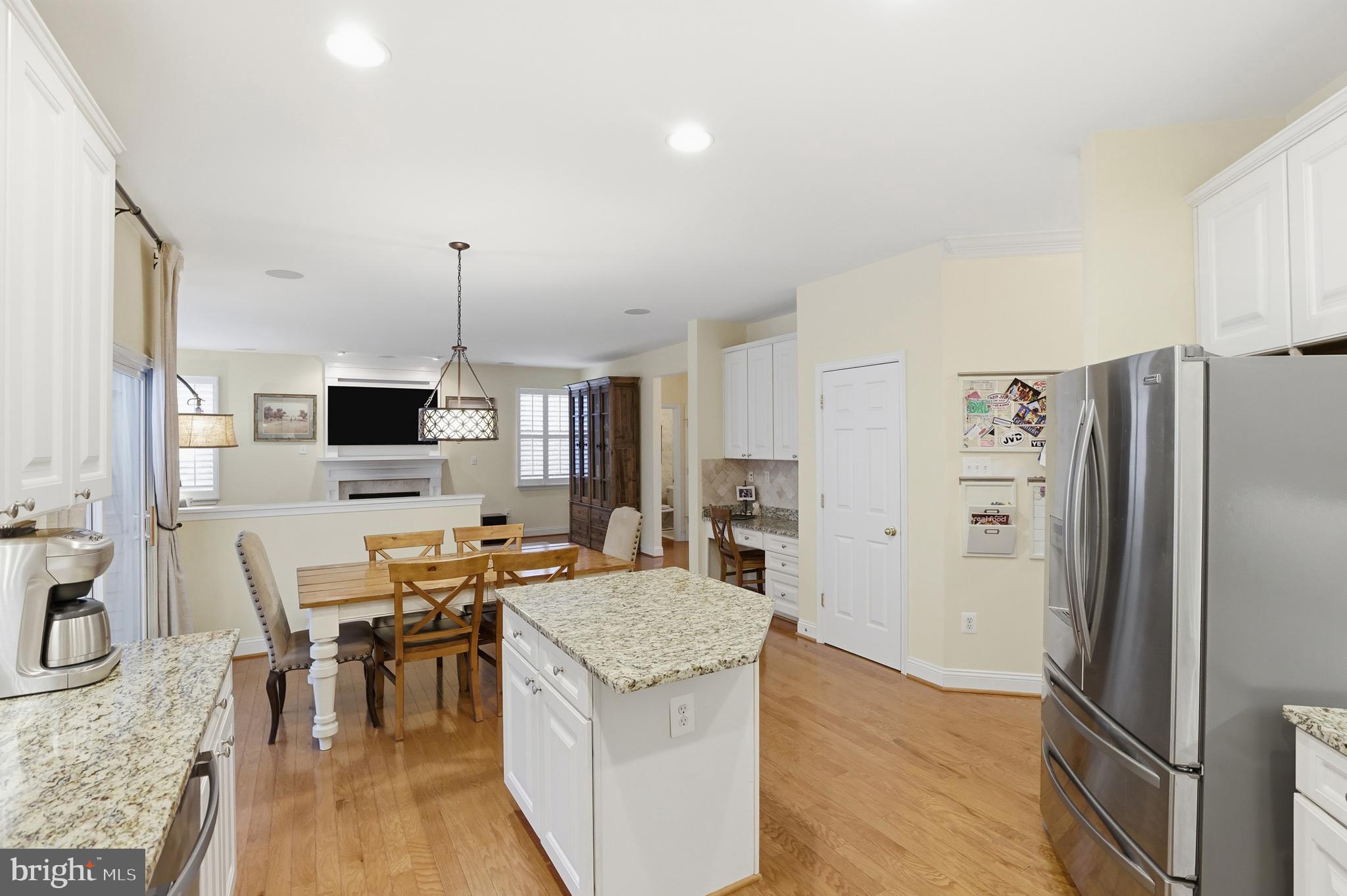 1612 Trawler Lane Annapolis, MD 21409 - Photo 7 of 48 a kitchen with stainless steel appliances granite countertop a refrigerator stove microwave and sink