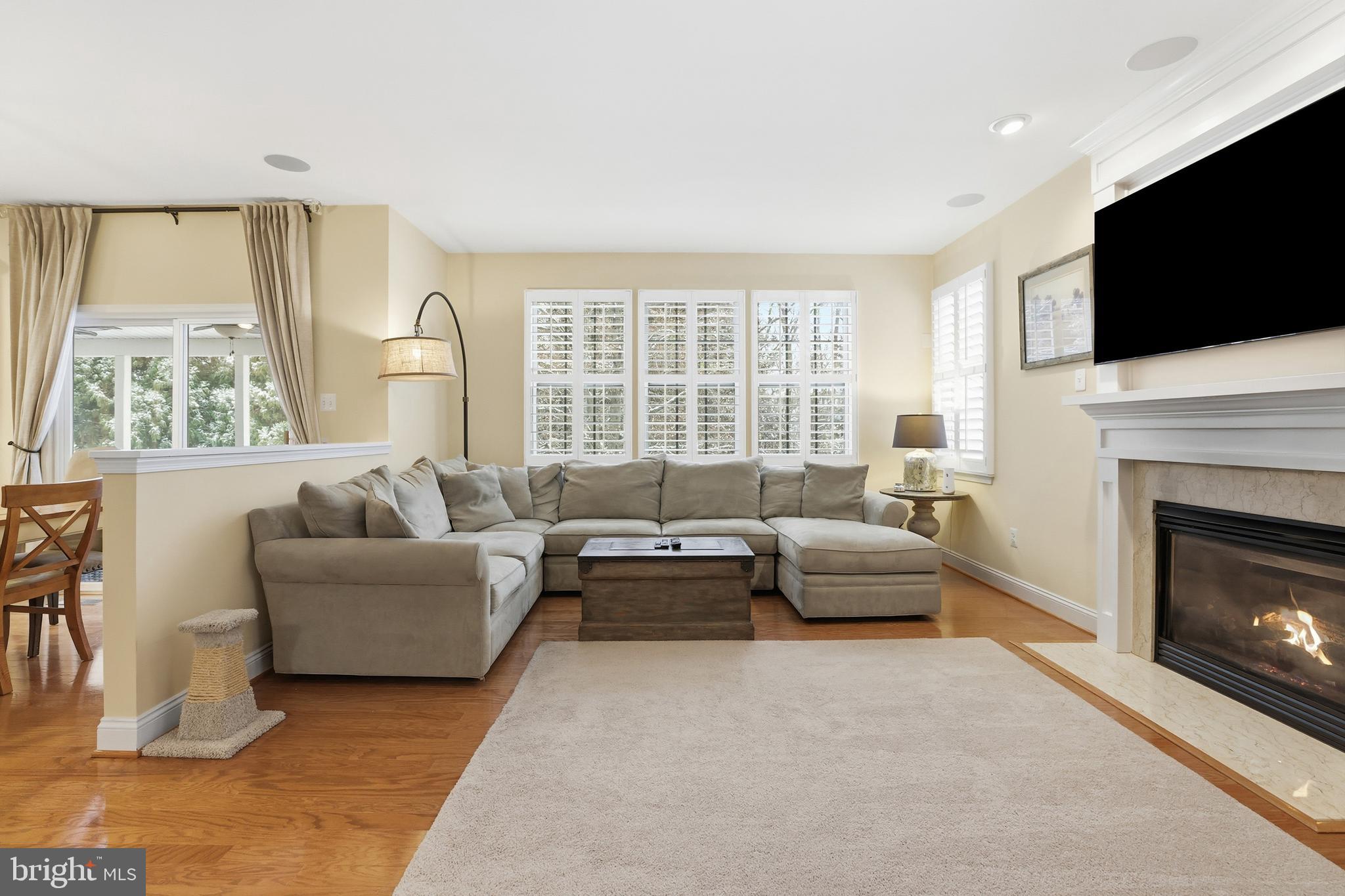 1612 Trawler Lane Annapolis, MD 21409 - Photo 8 of 48 a living room with furniture a flat screen tv and a fireplace