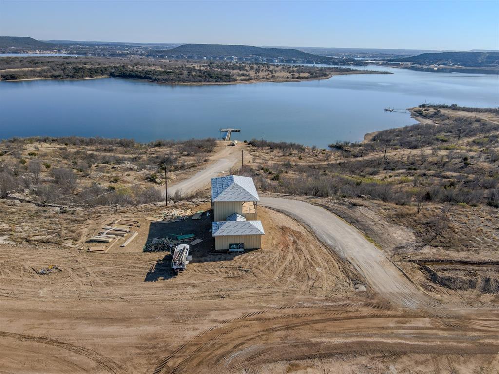 Lot 112 Clearwater Point Graham, TX 76450 - Photo 13 of 13 a view of a lake with a mountain