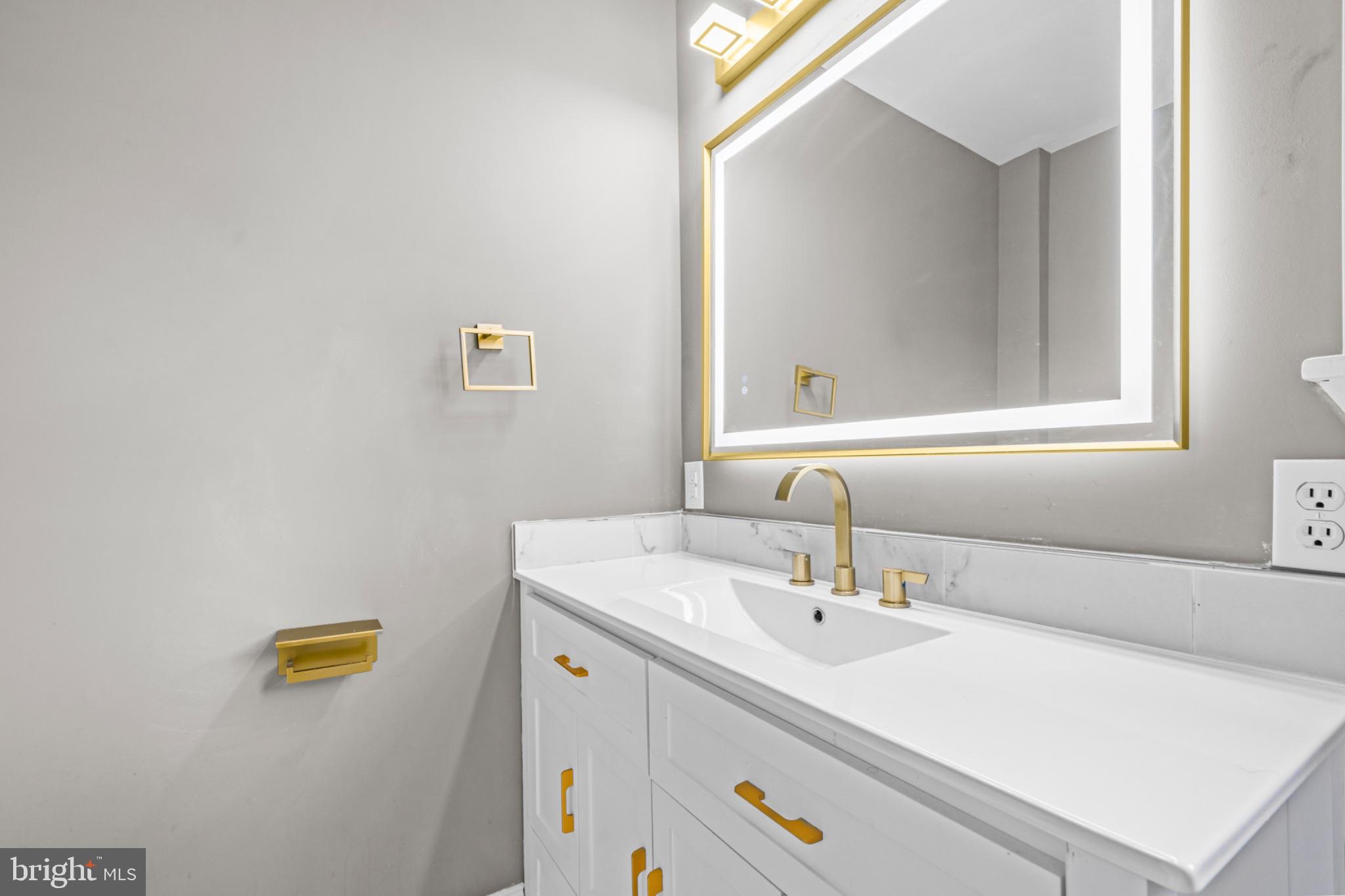 46 Boone Street Cumberland, MD 21502 - Photo 12 of 35 Sleek elegance in modern bathroom design.