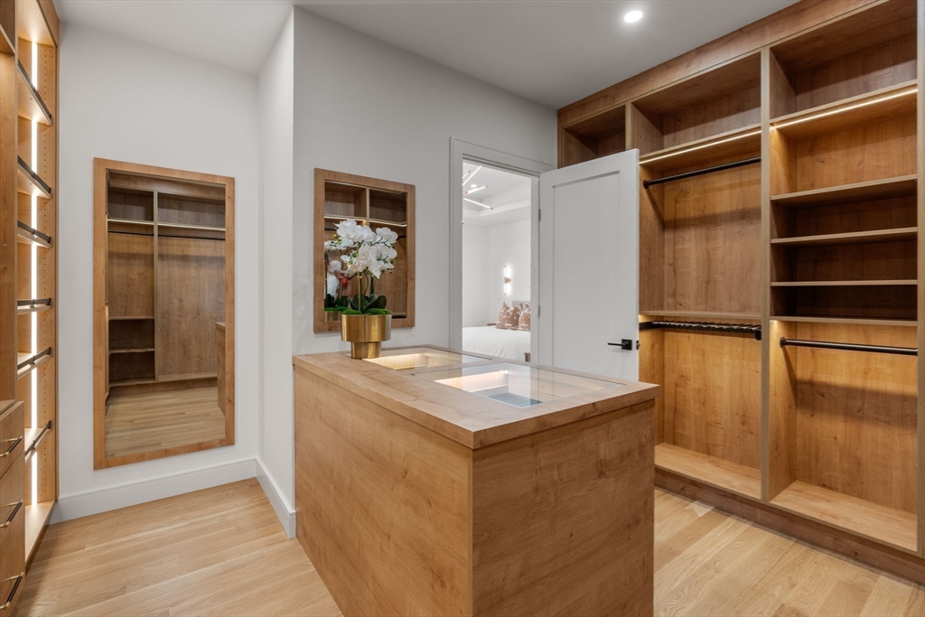 470 Quinobequin Road Newton, MA 02468 - Photo 23 of 37 a kitchen with a sink and refrigerator
