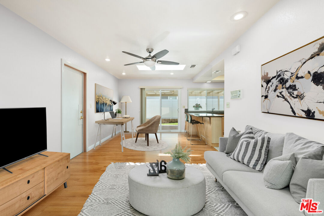1463 Morrow Circle Thousand Oaks, CA 91362 - Photo 13 of 25 a living room with furniture and a flat screen tv