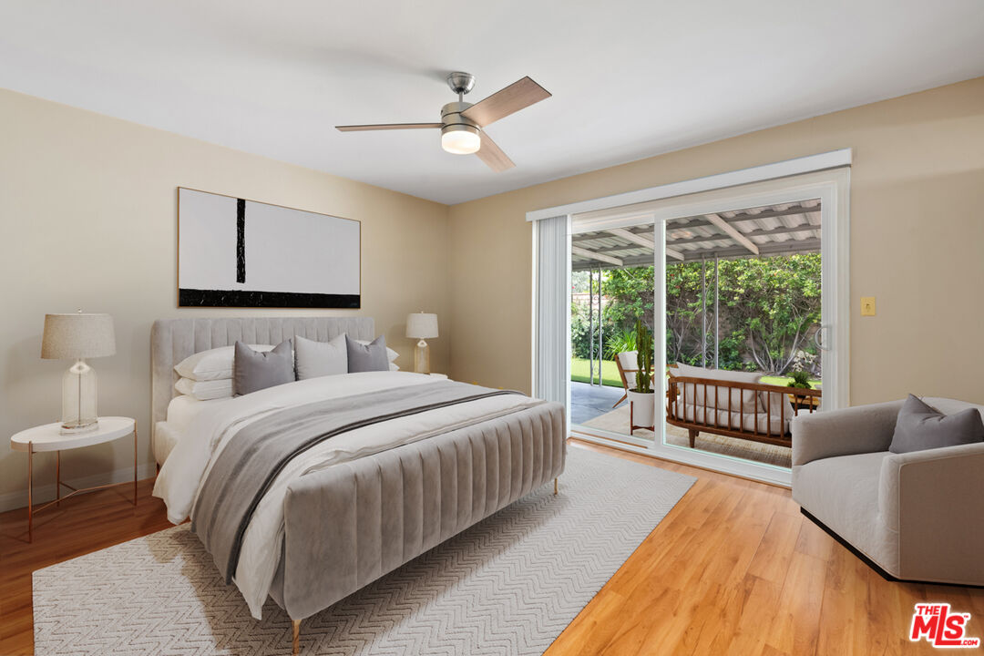 1463 Morrow Circle Thousand Oaks, CA 91362 - Photo 15 of 25 a bedroom with a bed and a large window