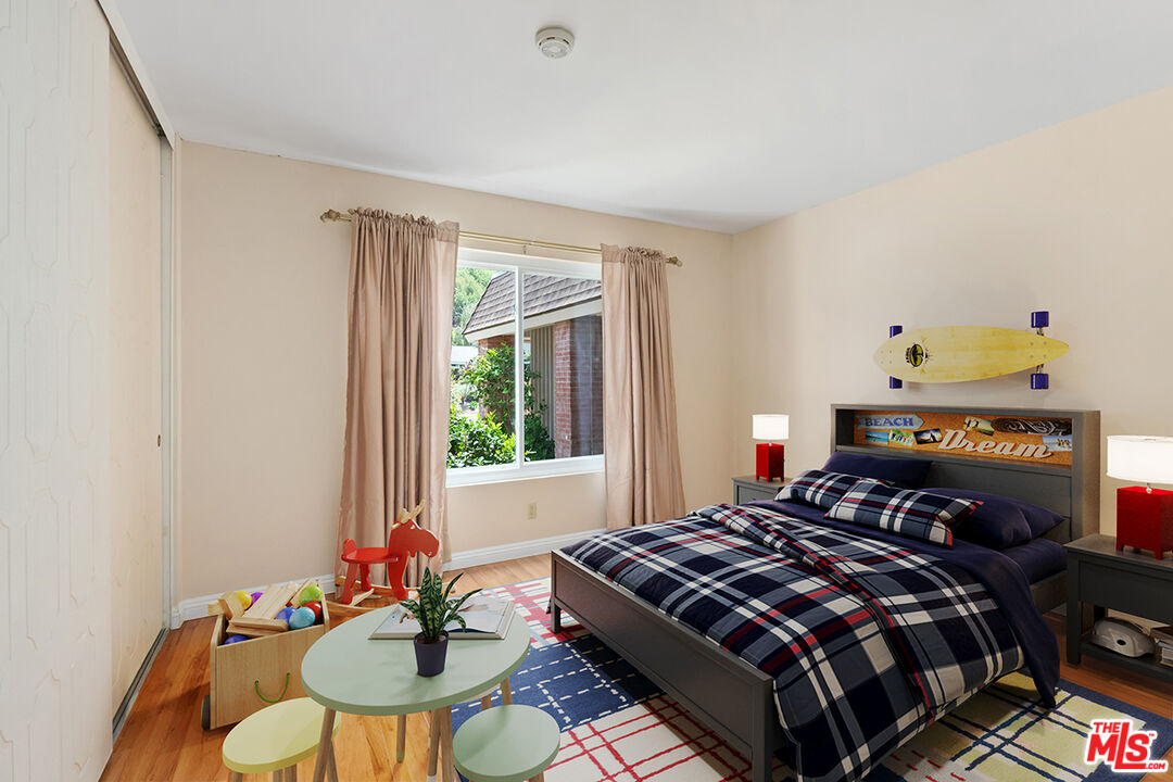 1463 Morrow Circle Thousand Oaks, CA 91362 - Photo 19 of 25 a bed sitting in a bedroom next to a window