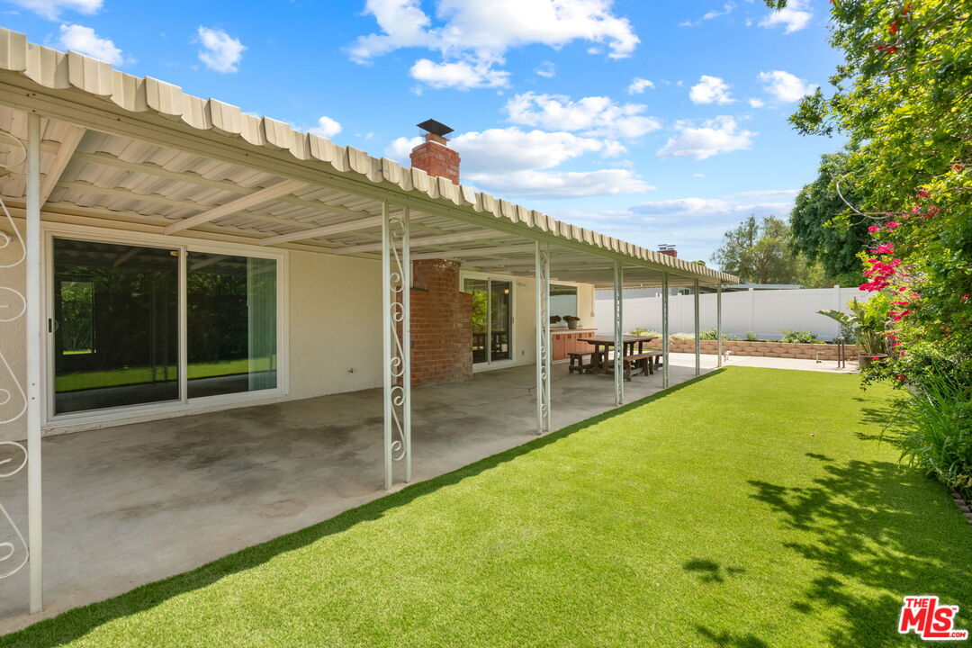 1463 Morrow Circle Thousand Oaks, CA 91362 - Photo 24 of 25 a view of a patio with table and chairs and potted plants