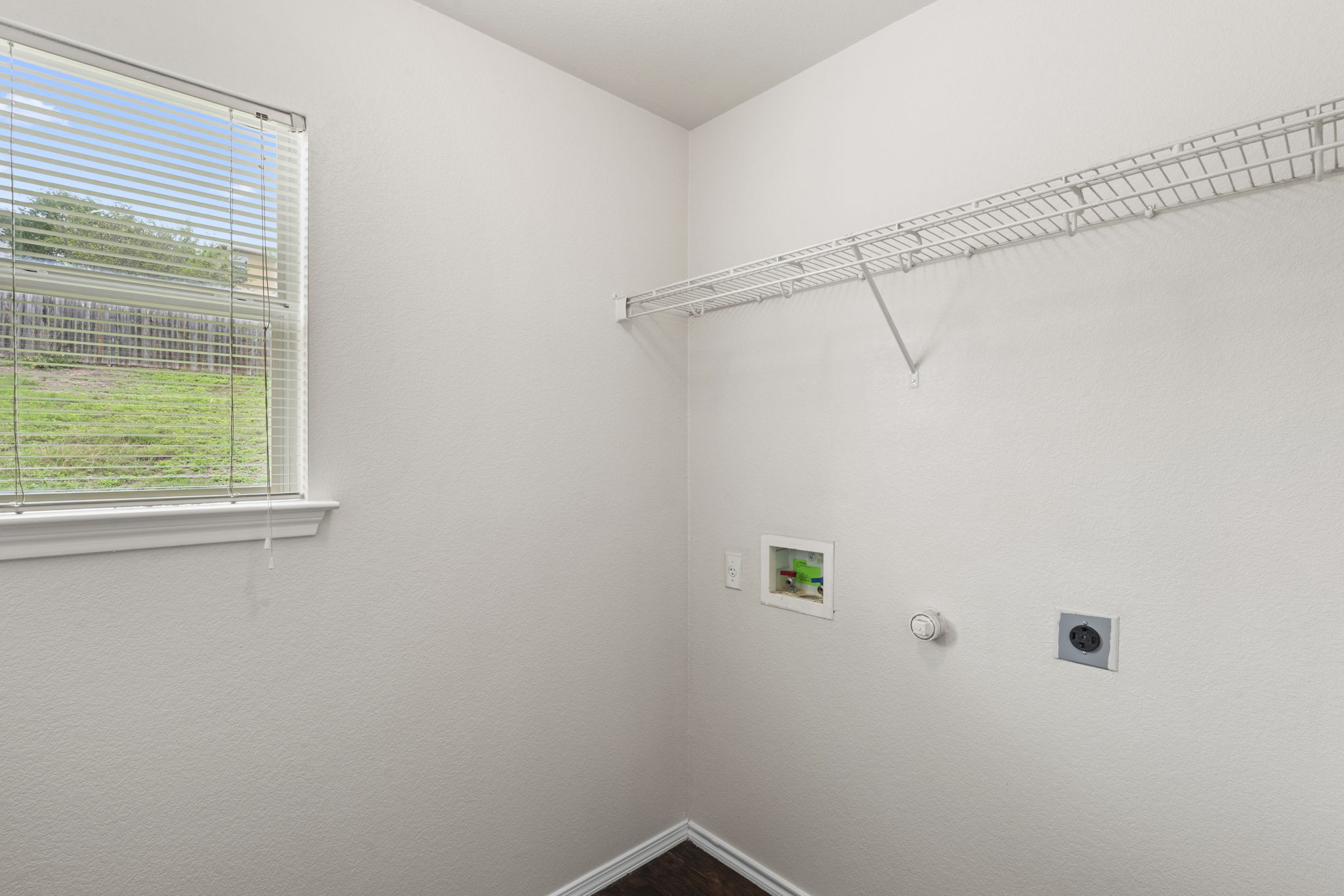 208 Dandelion Loop Kyle, TX 78640 - Photo 20 of 39 Laundry room on main level