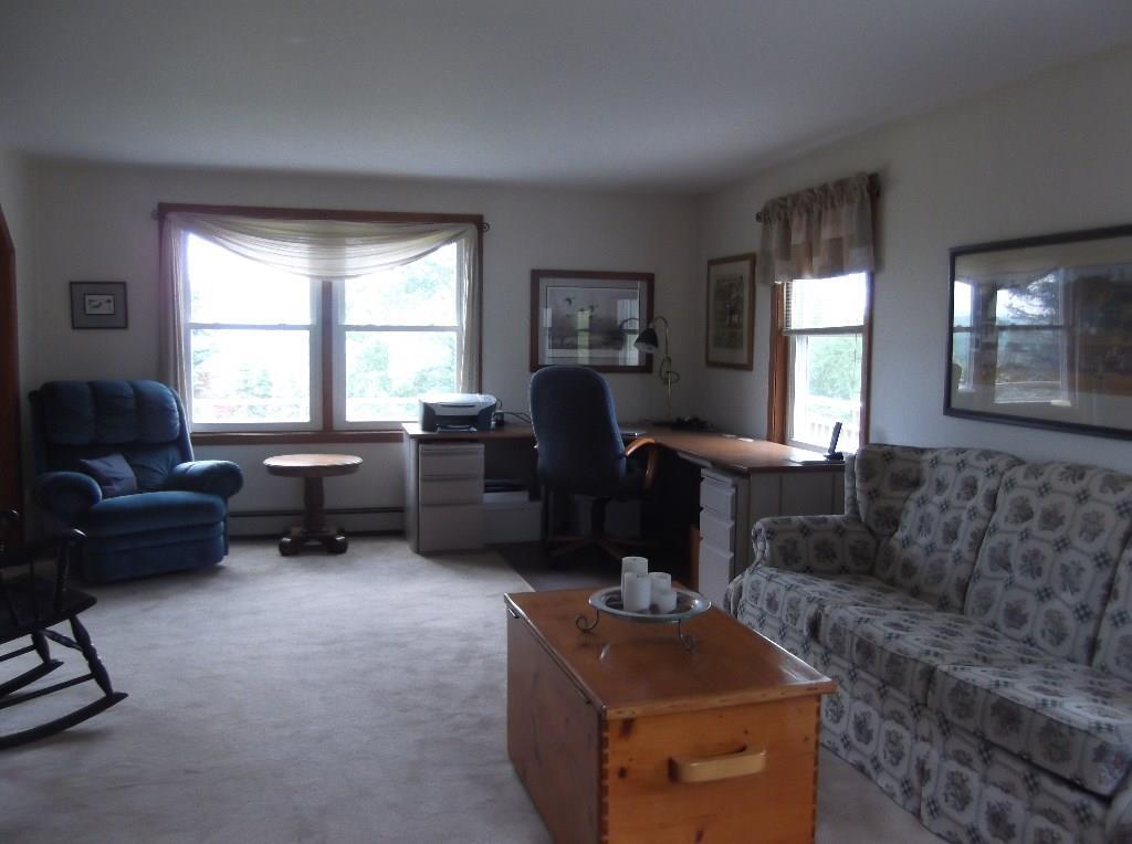 140 Ames Road Dover-Foxcroft, ME 04426 - Photo 13 of 30 Formal living room.