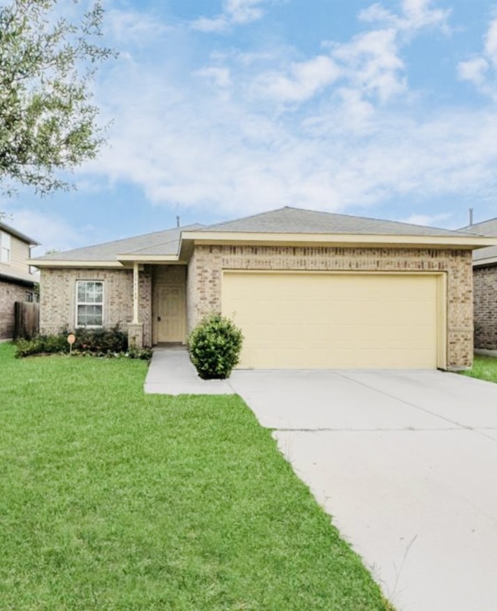 20414 Friesian Trail Humble, TX 77338 - Photo 1 of 6 a view of a house with a backyard