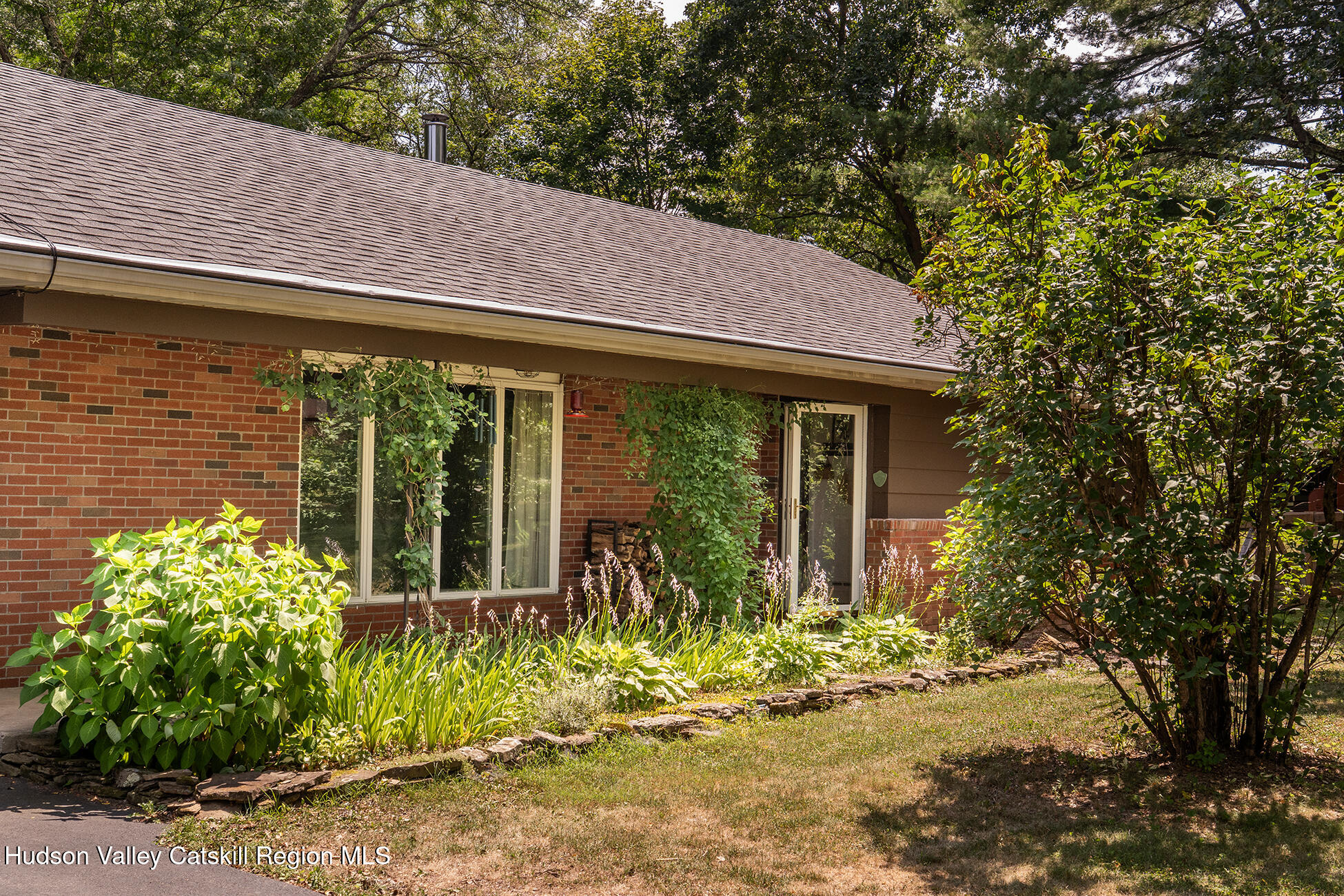 1002 Cairo Junction Road Catskill, NY 12414 - Photo 2 of 20 a front view of a house with garden