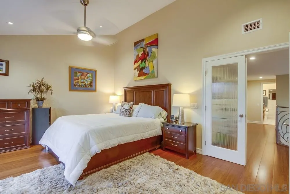 10 Sixpence Way Coronado, CA 92118 - Photo 18 of 23 a bedroom with a bed and a dresser