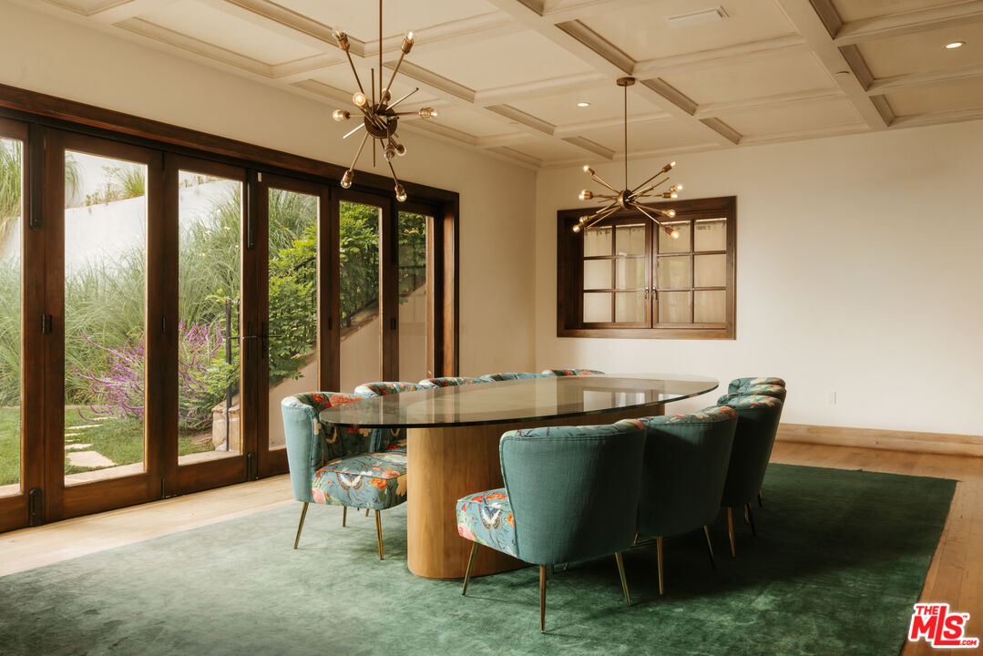 1105 Rivas Canyon Road Pacific Palisades, CA 90272 - Photo 36 of 49 a view of a dining room with furniture window and outside view