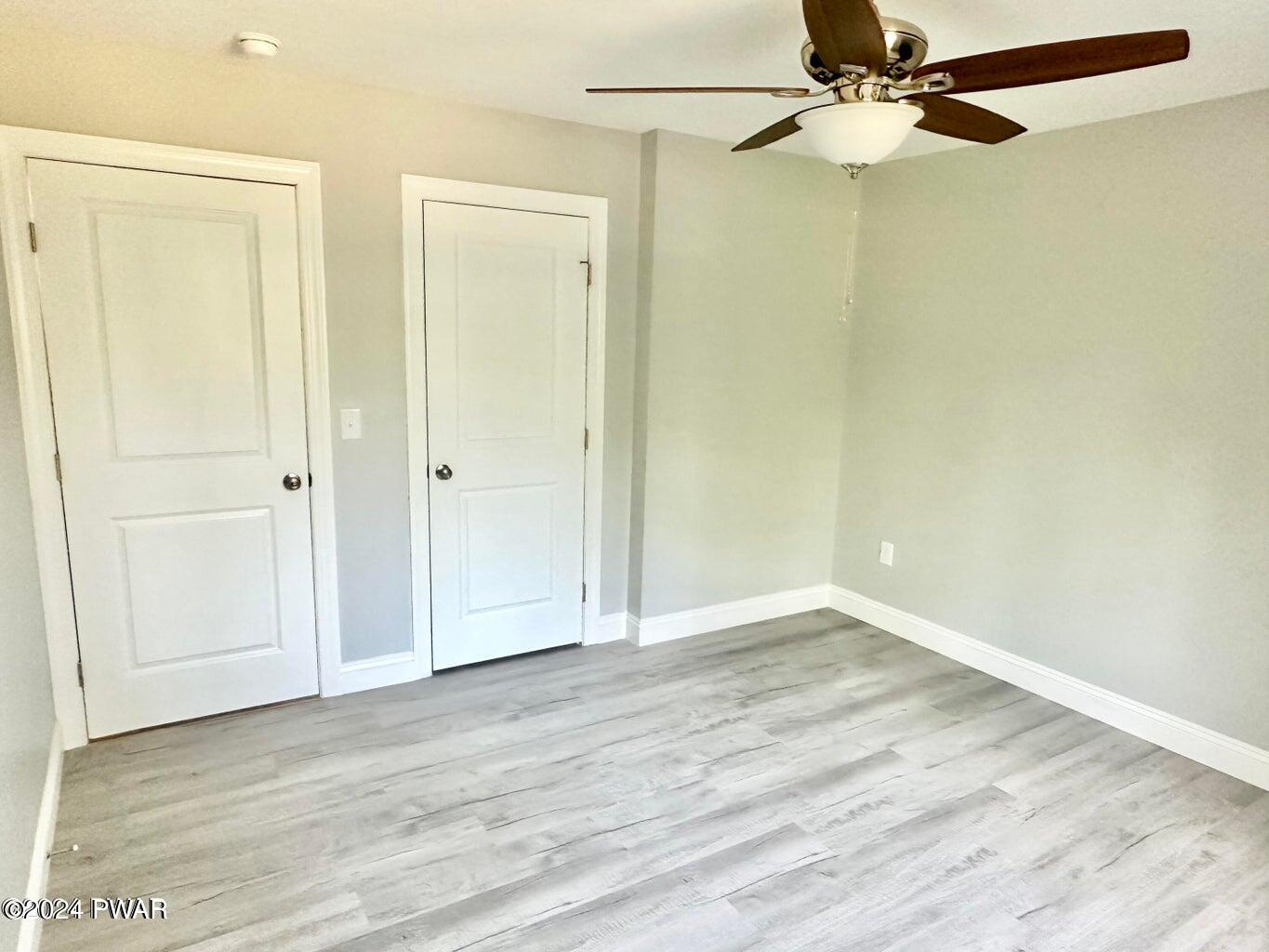 123 R Rhododendron Lane Milford, PA 18337 - Photo 13 of 29 wooden floor in an empty room