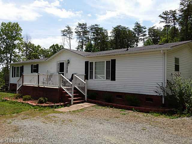 1038 Creekside Way Road Pinnacle, NC 27043 - Photo 1 of 6 Exterior Front. Nice country setting