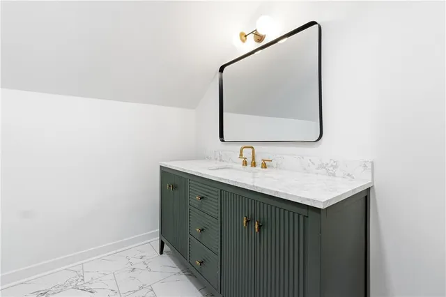 a bathroom with a toilet and a bathtub