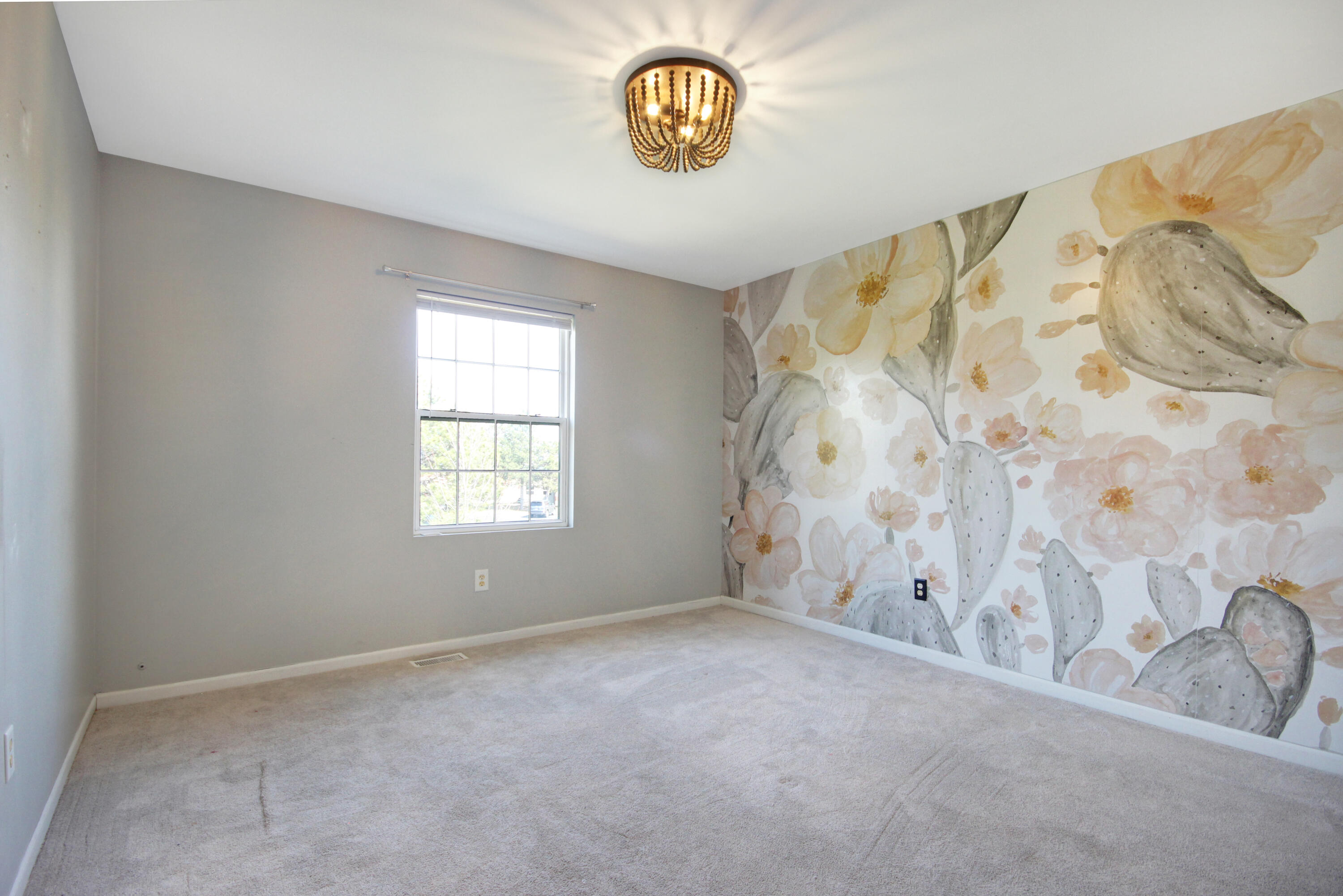 8109 Victoria Place Crown Point, IN 46307 - Photo 22 of 26 a view of an empty room with a window