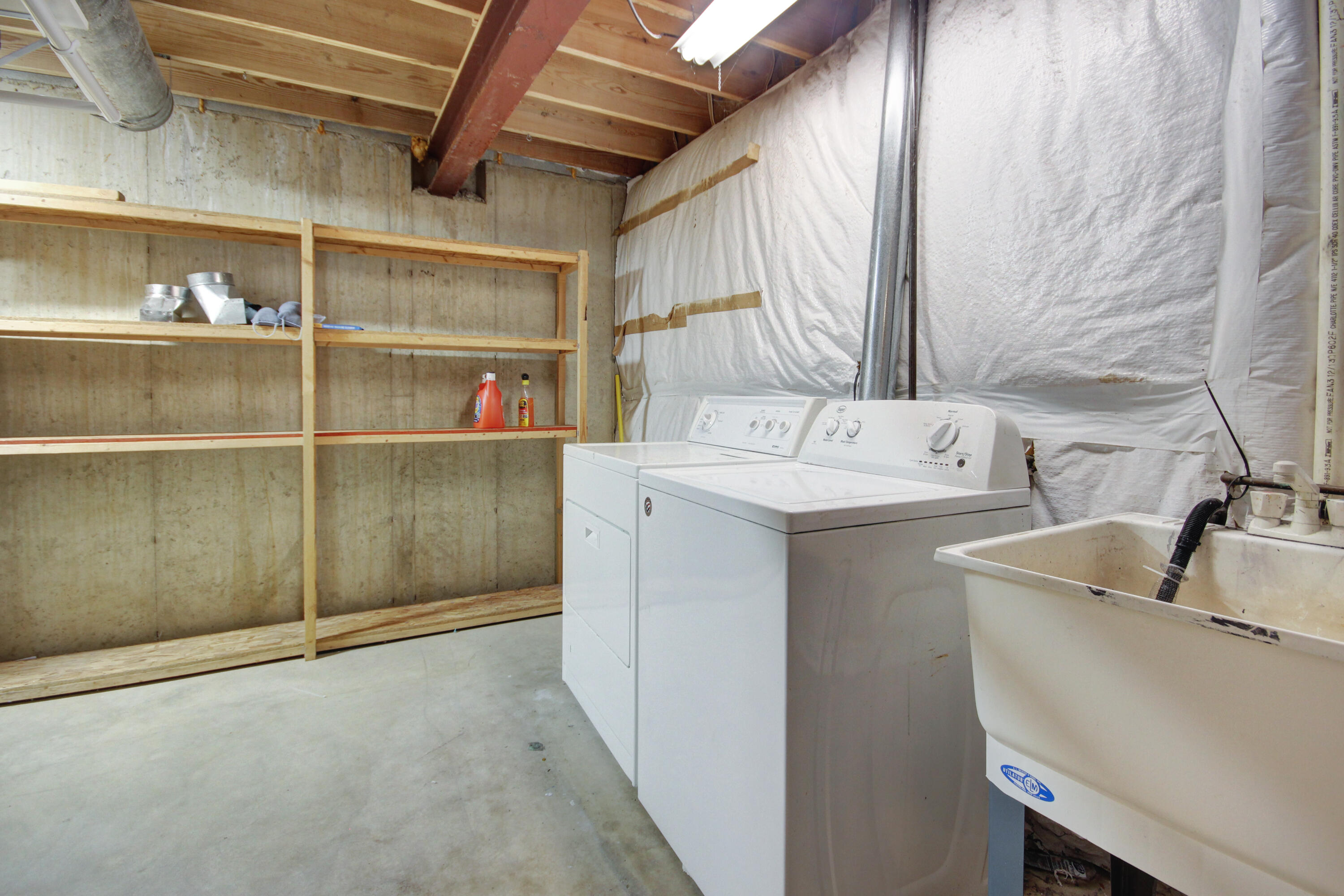 8109 Victoria Place Crown Point, IN 46307 - Photo 23 of 26 a utility room with dryer and washer