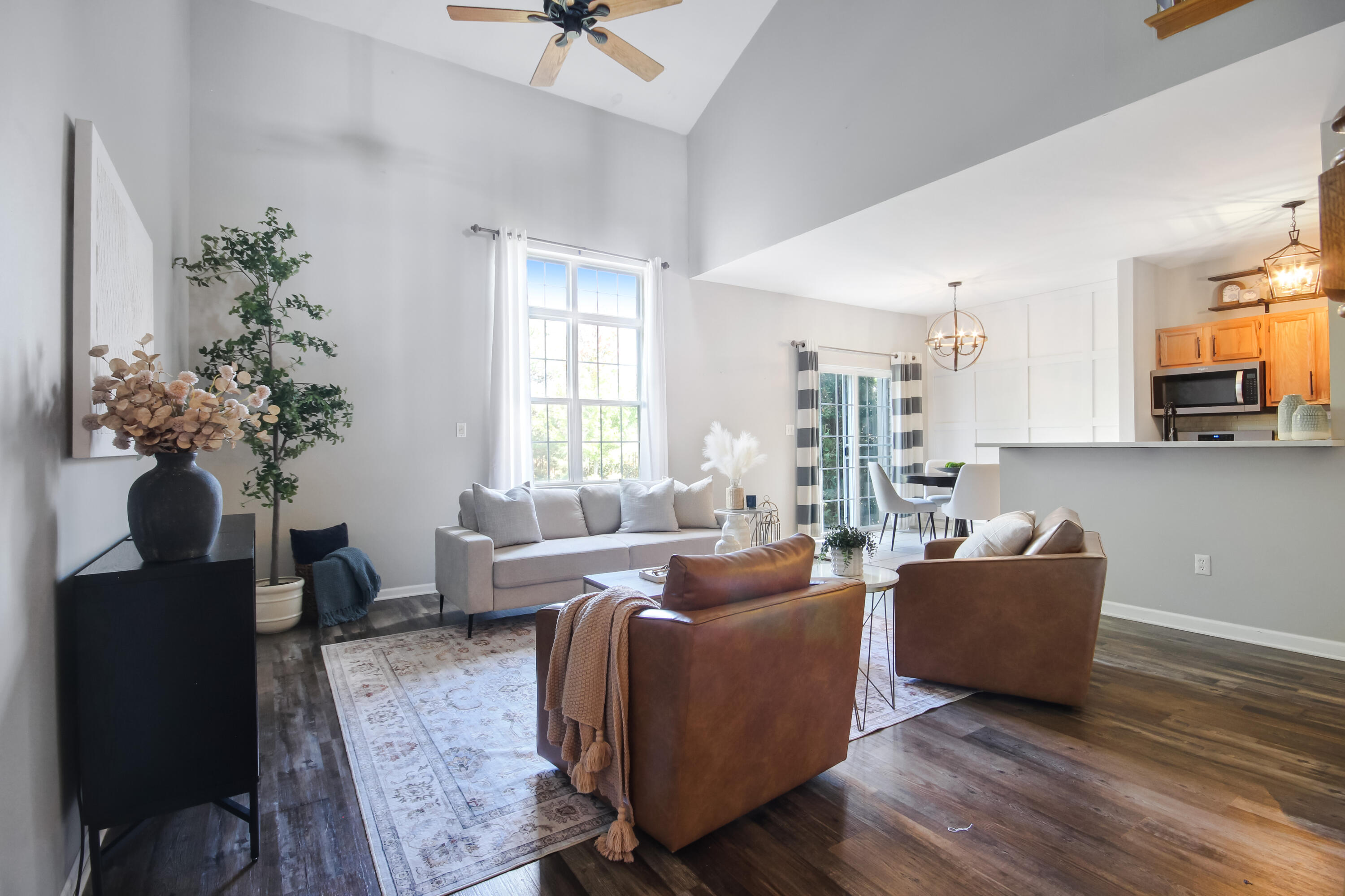 8109 Victoria Place Crown Point, IN 46307 - Photo 4 of 26 a living room with furniture and a large window