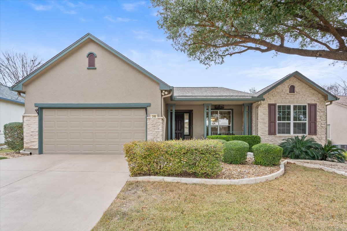 246 Red Poppy Trail Georgetown, TX 78633 - Photo 6 of 32 a front view of a house with a yard and garage
