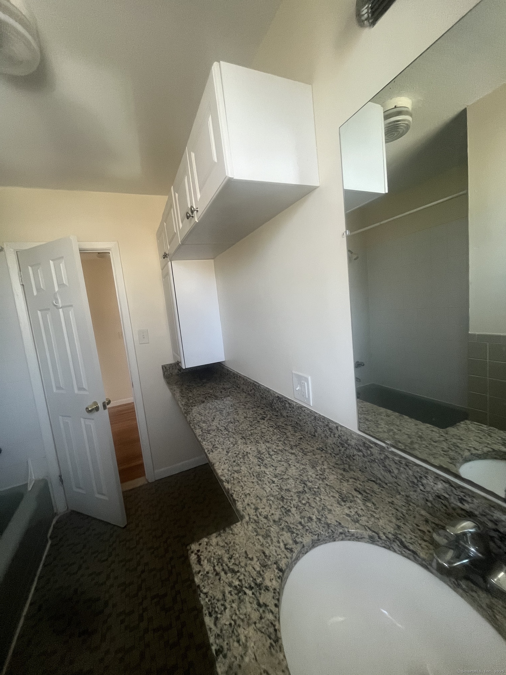 492 Fountain Street, Unit 504C2 New Haven, CT 06515 - Photo 13 of 20 a bathroom with a sink and a mirror